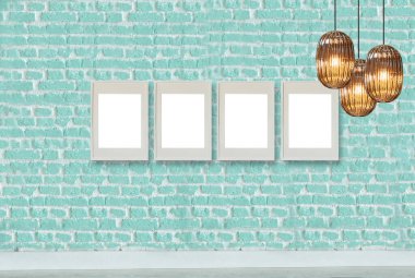 yeşil dekoratif tuğla duvar, boş çerçeve, modern lamba ve iç tasarım