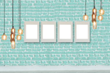 yeşil dekoratif tuğla duvar, boş çerçeve, modern lamba ve iç tasarım