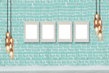 yeşil dekoratif tuğla duvar, boş çerçeve, modern lamba ve iç tasarım