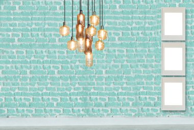yeşil dekoratif tuğla duvar ve boş çerçeve. modern lamba