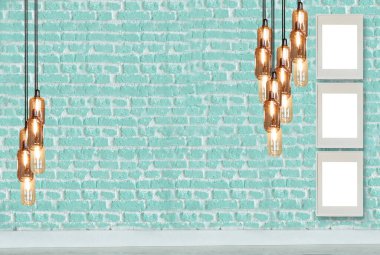 yeşil dekoratif tuğla duvar ve boş çerçeve. modern lamba