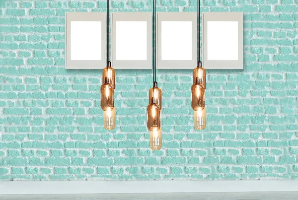 yeşil dekoratif tuğla duvar, boş çerçeve, modern lamba ve iç tasarım