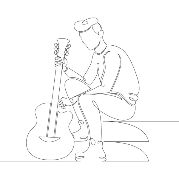 Jonge mannelijke muzikant zit op de trap met een gitaar in zijn handen. — Stockvector