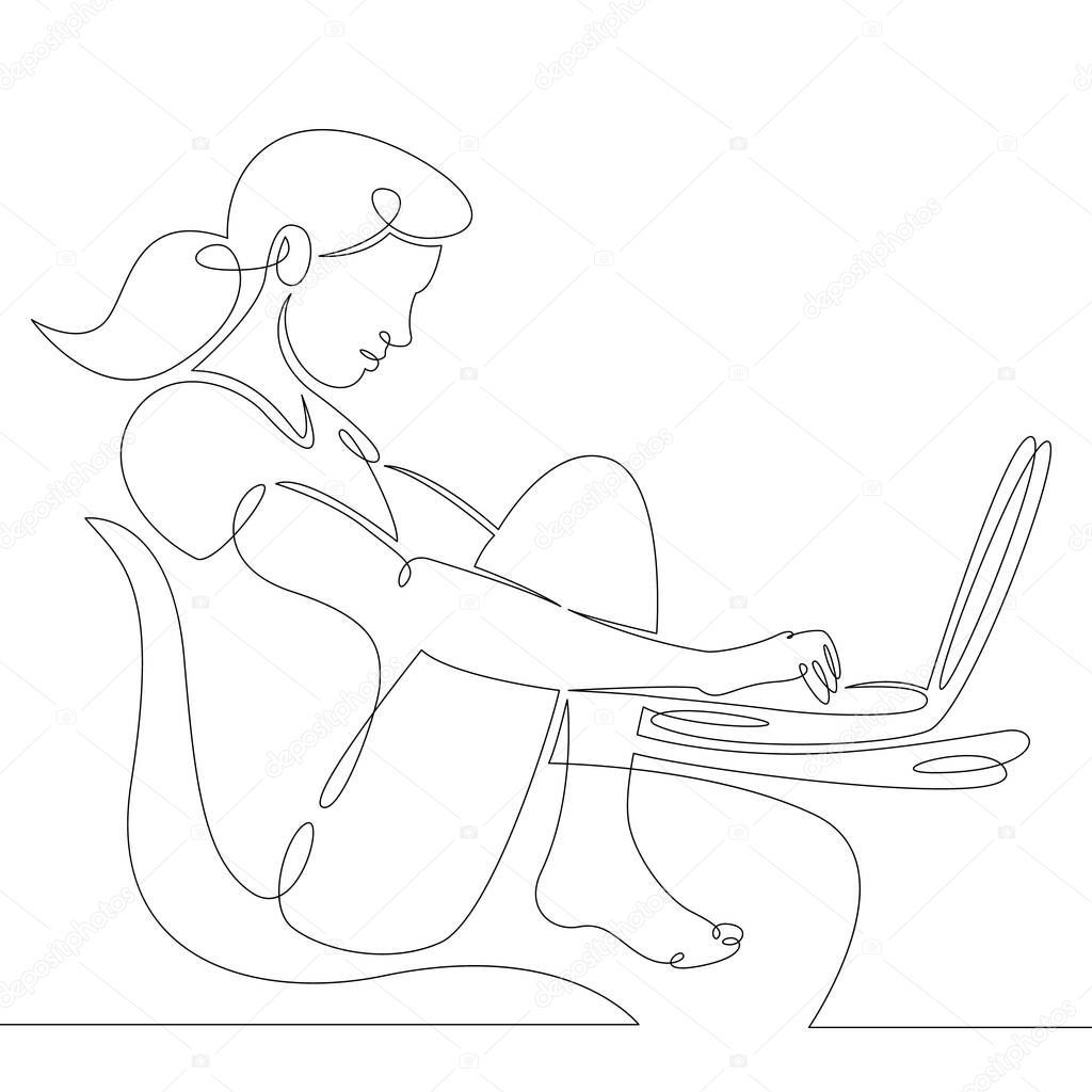 Young woman girl sitting in a chair works for a laptop.