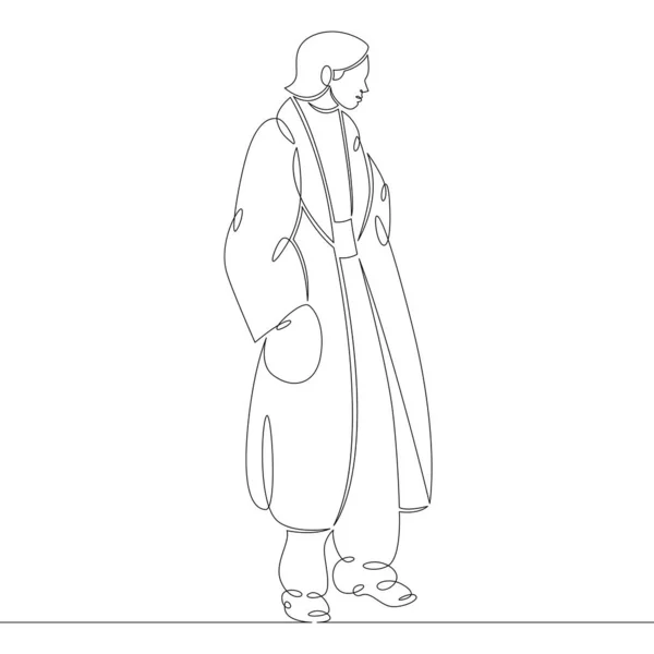 Retrato de una joven con un abrigo moderno de moda. — Vector de stock