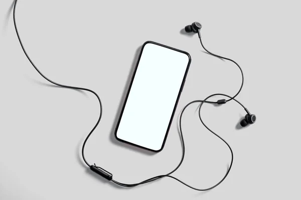 Trendy Mobile Phone Application Mockup with Headphones — Stock Photo, Image