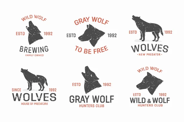 Set of vintage wolf logo and label design elements — Stock Vector