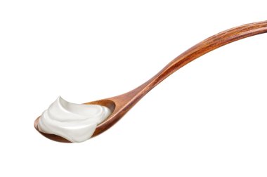 Wooden spoon with joghurt clipart