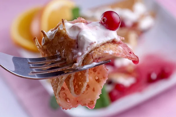 Pancakes with sour cream — Stock Photo, Image