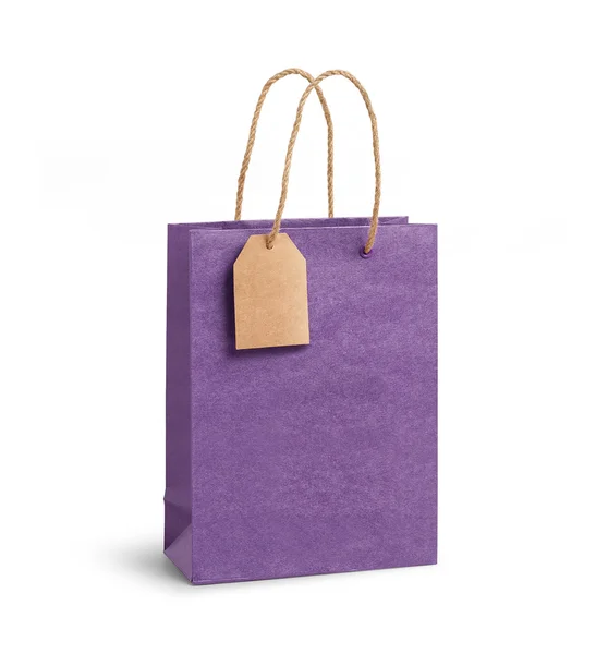 Paper gift bag with tag — Stock Photo, Image