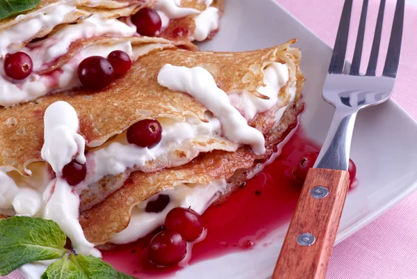 Pancakes with sour cream — Stock Photo, Image