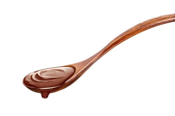 Wooden spoon with chocolate — Stock Photo, Image