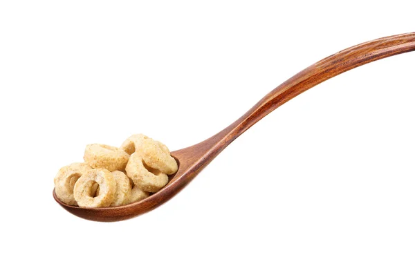 Cuchara de madera con anillos de cereales — Foto de Stock