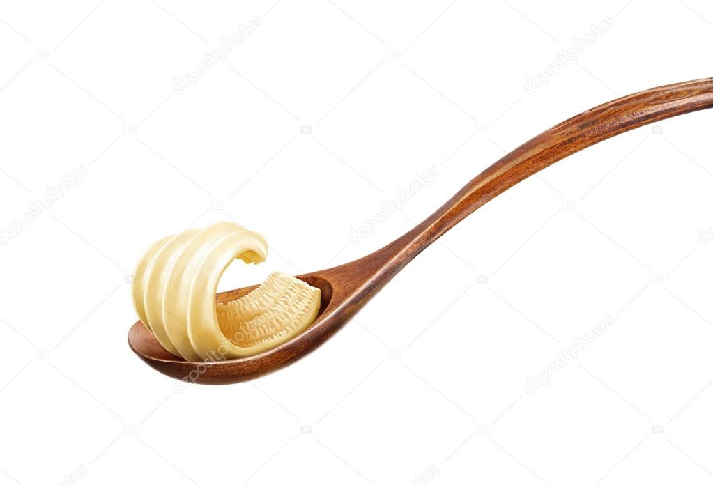 Wooden spoon with butter