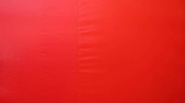 Red canvas wall. Textured or red canvas background for Christmas or Chinese New Year background. Selective focus