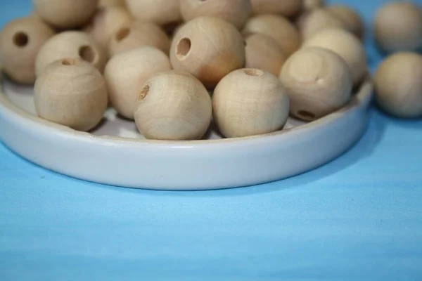 Wooden Beads Blue Background — Stock Photo, Image