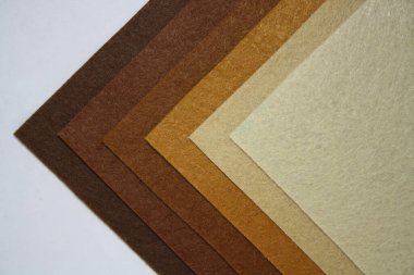 Tekstil malzemesi gibiydi. El yapımı ve yaratıcı için özgün bir el işi. Kahverengi