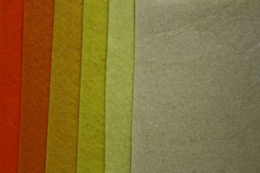 Tekstil malzemesi gibiydi. El yapımı ve yaratıcı için özgün bir el işi. Sarı keçe