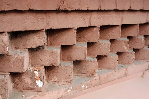 Sokaktaki tuğla duvar. Eski bir geçmiş. Metin için boşluk.