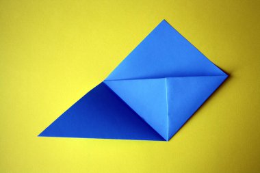 Adım adım fotoğraf talimatları. Bir kitap için origami kağıt ayracı nasıl yapılır? Çocuklu dersler. DIY. 7. Adım