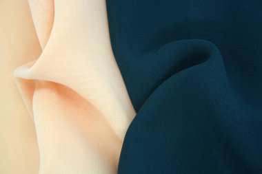 Arka plan dalgalar halinde duran sentetik kumaştan yapılmış. Metin için boşluk.