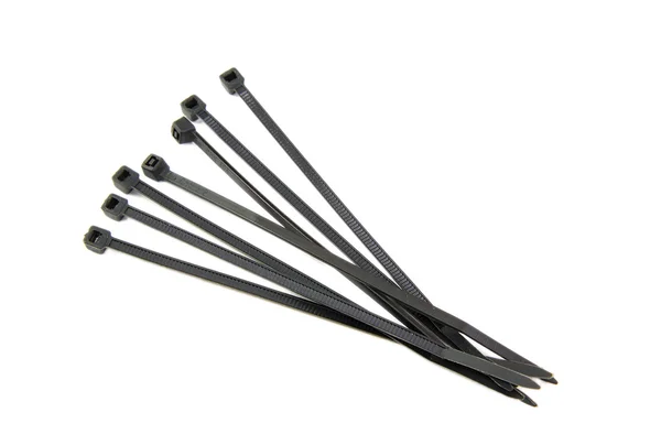 Bunch of black cable ties — Stock Photo, Image