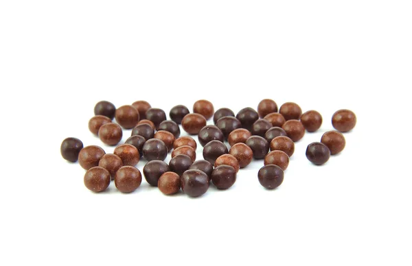 Bolas de chocolate sobre un fondo blanco. —  Fotos de Stock