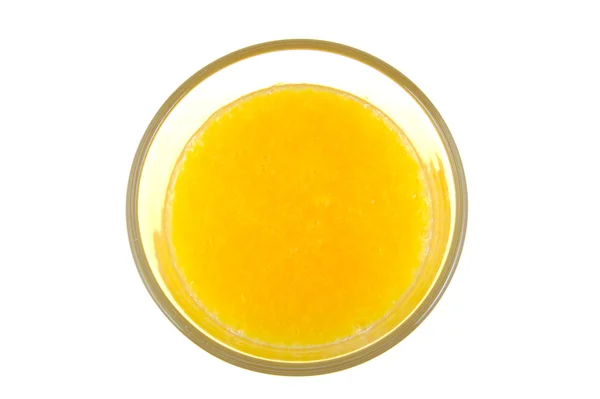 Vaso de zumo de naranja aislado sobre blanco. Vista superior . — Foto de Stock