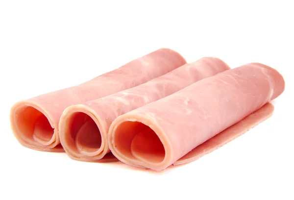 Cooked boiled and rolled ham sausage on white background. — Stock Photo, Image