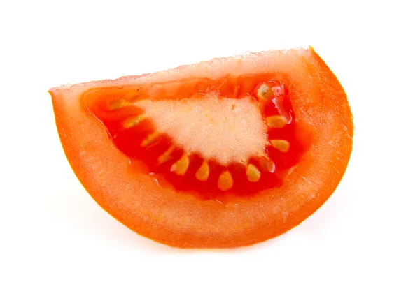 Μία φέτα ντομάτα σε άσπρο φόντο. — Φωτογραφία Αρχείου