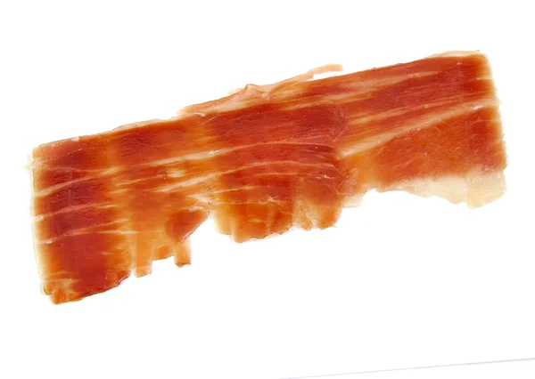 Spanish serrano ham slice isolated on white background. — Stock Photo, Image