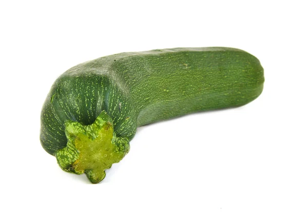 Frontal view of a green and ripe zucchini on white background. — Stock Photo, Image