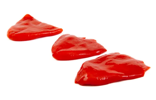 Pečené červené papriky v olivovém oleji izolovaných na bílém pozadí — Stock fotografie
