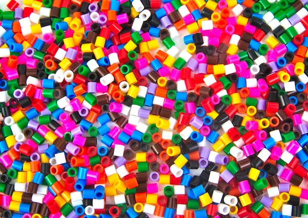 Jouets colorés en plastique pour petits cylindres — Photo