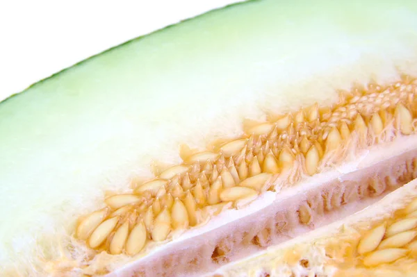 Closeup půl melounu ukazující semena. Piel de sapo — Stock fotografie