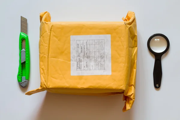 Paquete amarillo del unboxing de China . Imagen de stock