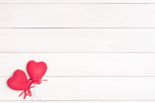 Two red hearts on sticks. — Stock Photo, Image