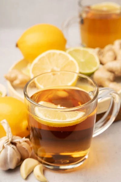 Hot herbal tea with ginger, garlic, lemon and honey — Stock Photo, Image