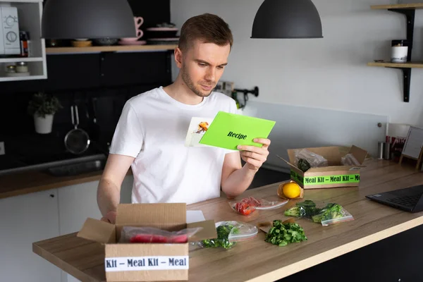 Thoughtful Caucasian White Man Unpack Online Home Food Delivery Box — Stock Photo, Image