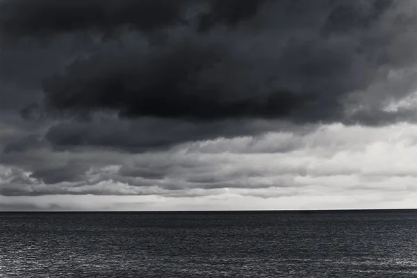 Dark cloud above the sea — Stock Photo, Image