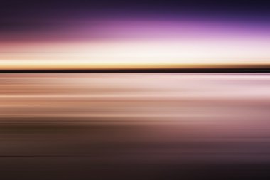 uzun pozlama etkisi, bulanık hareket ile renkli günbatımı