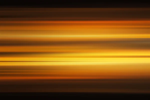 Colorful sunset with long exposure effect, motion blurred — Stock Photo, Image