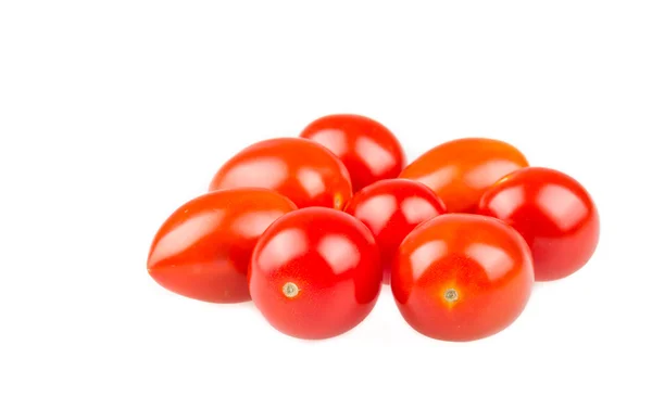 Tomates cherry rojos sobre fondo blanco Imagen De Stock