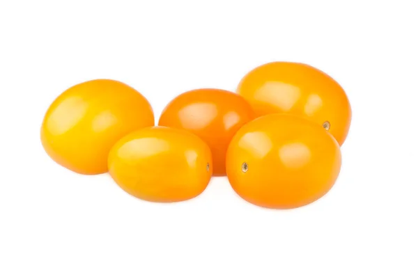 Tomate amarillo cereza sobre fondo blanco Fotos De Stock