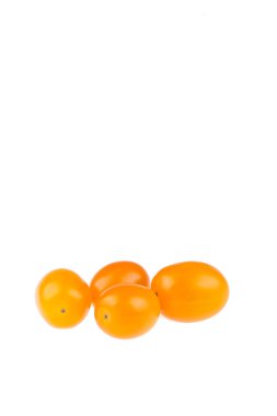 beyaz zemin üzerine sarı kiraz domates