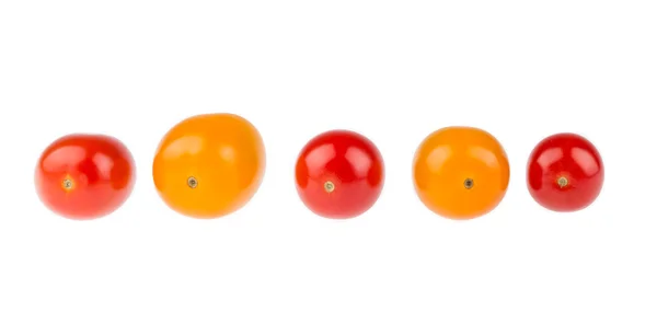 Yellow and red cherry tomatoes over white background — Stock Photo, Image