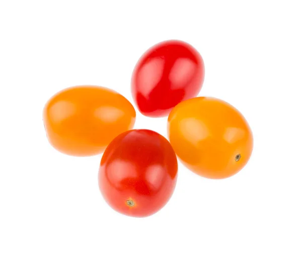 Yellow and red cherry tomatoes over white background — Stock Photo, Image