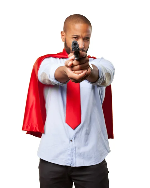 Black businessman with gun — Stock Photo, Image