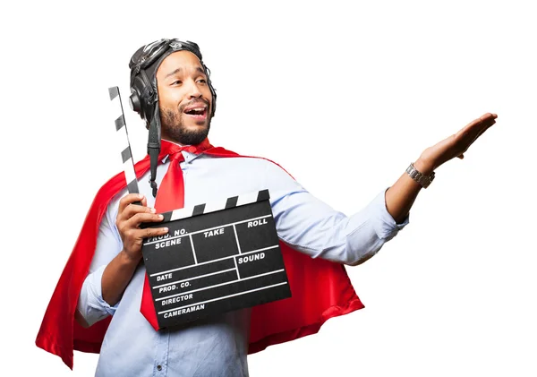 Homme d'affaires noir avec expression heureuse et clapperboard — Photo