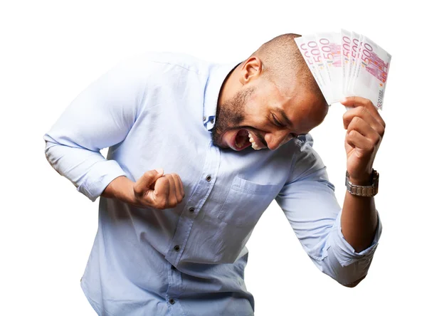 Homem de negócios negro com expressão feliz e dinheiro — Fotografia de Stock